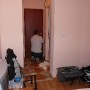 The hotel owner assisting to open the door room from the inside