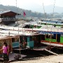 Mekong River slowboats that take tourists down on a 2 days trip to Luang Prabang.
