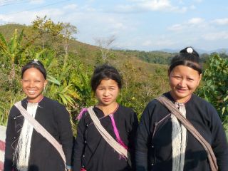We couldn't understand each other but these ladies (from which hill tribe ??) graciously smile for the camera.