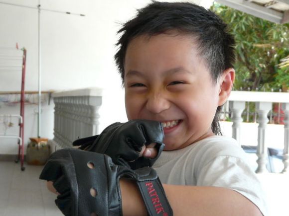 This cute little fella is Jarvis Leow. He is ready to play !!