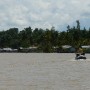View of traditional wooden stilt houses as we approach Tanjung Selor