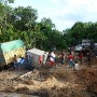 We waited 2-1/2 hrs for this situation to be unblocked. Behind us (and in front of us coming from opposite direction) were ... a jungle traffic jam as others vehicles crawled up.