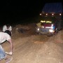 2nd day midnight : this heavy truck could not get out despite being pulled by 2 other trucks simultaneously. The road is blocked. No choice, we spent our 2nd evening here ... Iwan wanted to drive all night. A number of "friends" on the road came to sleep on our truck (its not possible for them to sleep 5 persons inside their cramped cars).