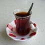 Traditional Turkish tea offered by the manager of the truckstop