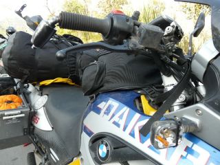 Signs of impact : right trottle end bent (rubber grip cut to allow trottle trust), right mirror broken away, broken right front signal , broken brake lever replaced with the spare I carry.