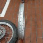 This photo confirm that the original rim was really off true circle. Replaced by a temp 2nd hand Japanese 21" rim (equally not true circle, but rideable).