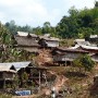 Typical village out in the countryside in Northern Laos. Many villages out here in the hills have no electricity or pipe-in water.