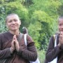 On the lonely stretch of country road, I came upon these 2 women monks walking. This was how they greeted me.