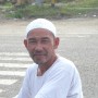 Warm expression and curiousity on a face of a man that welcome my arrival in his hometown.
