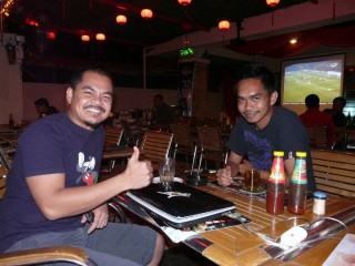 Having a drink with 2 locals at my hotel. On left is Md Read One, and Irwan.